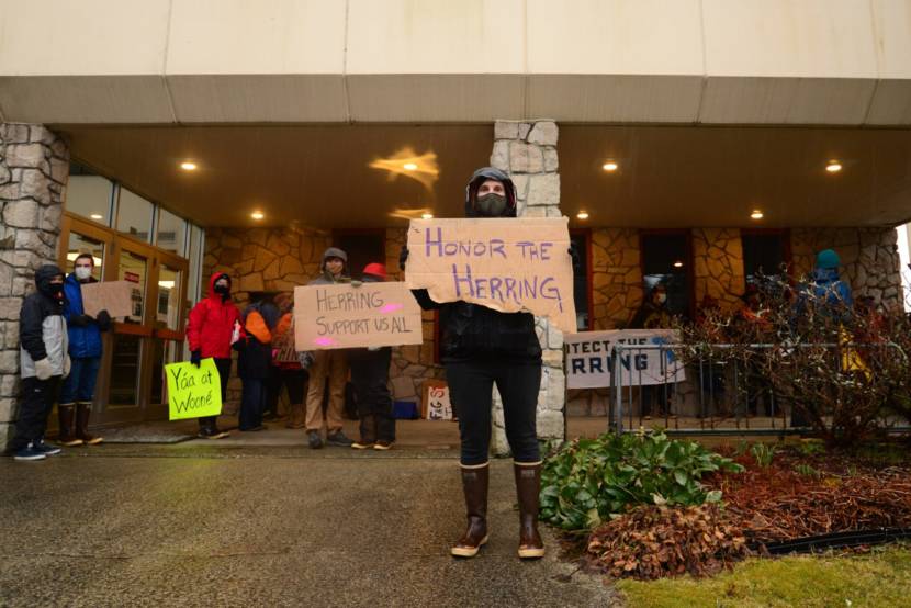 Demonstrators gathered outside of Sitka Courthouse earlier this week as a commercial herring fisher is slated to begin. (KCAW/Berett Wilber)