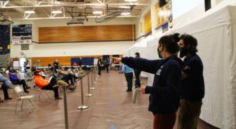 Despite difficulties with getting access to COVID-19 vaccines earlier in the year, roughly 1,800 people in Unalaska were vaccinated at a mass vaccination clinic on Thursday. (Maggie Nelson/KUCB)