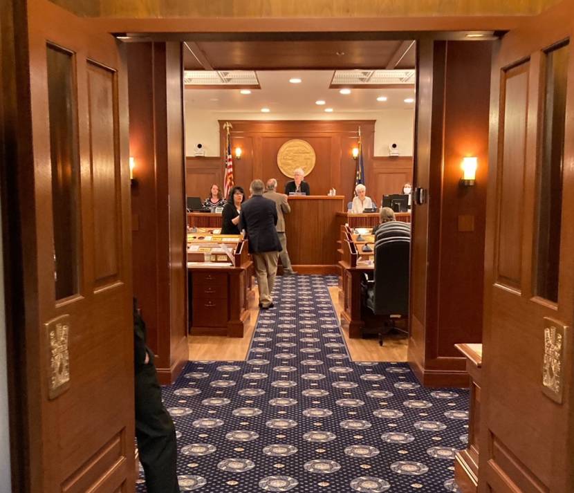 Alaska House Speaker Luise Stutes, R-Kodiak, center, prepares for the start of the floor session on June 25, 2021, in the Alaska State Capitol in Juneau, Alaska. Stutes expressed confidence that the state would vote to resolve an impending shutdown of much of the state government. (Photo by Andrew Kitchenman/KTOO and Alaska Public Media)