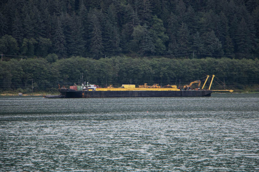 The Columbia Layne sails through the Gastineau Channel after crashing into the Douglas Bridge on Aug. 25, 2021 in Juneau, Alaska. (Photo by Lyndsey Brollini/KTOO)