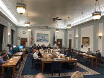 The Alaska Legislative Budget & Audit Committee meets shortly before voting to approve hiring a law firm to investigate the firing of Angela Rodell as the executive director of the Alaska Permanent Fund Corp., on Jan. 27, 2022, in the Alaska State Capitol in Juneau, Alaska. (Photo by Andrew Kitchenman/KTOO and Alaska Public Media)