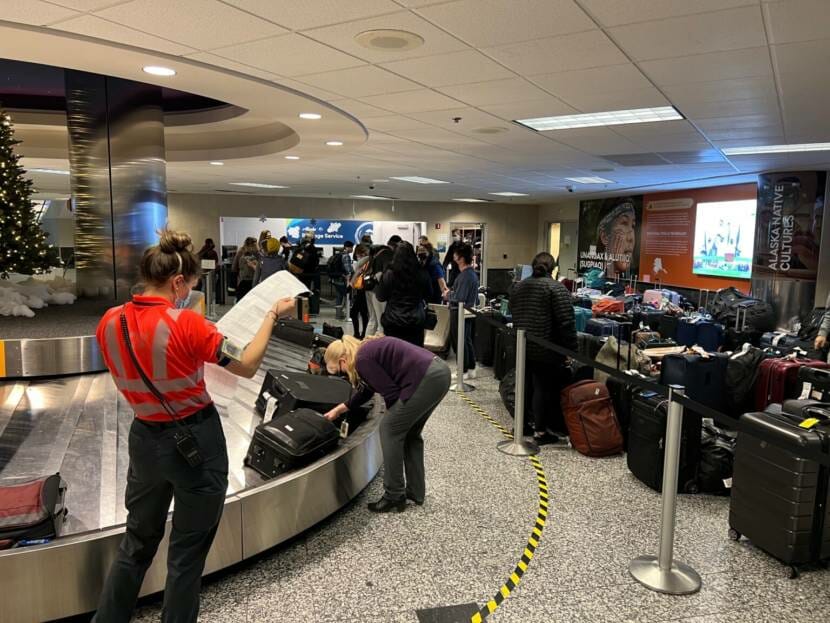 A crowded baggage claim area