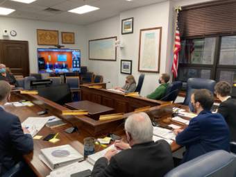 Members of the Alaska House Labor and Commerce Committee listen to U.S. Sen. Lisa Murkowski speak via teleconference. Murkowski, U.S. Sen. Dan Sullivan and U.S. Rep. Don Young, all Republicans, spoke about the new federal infrastructure law. (Photo by Andrew Kitchenman/KTOO and Alaska Public Media)