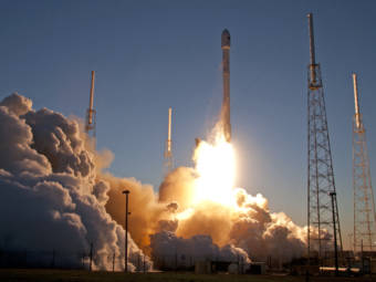 A rocket lifting off from a launch pad