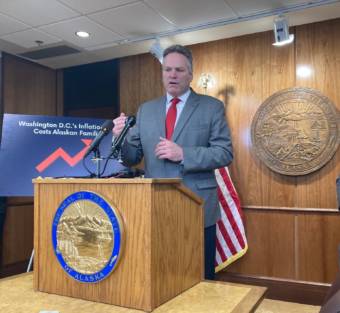 Gov. Mike Dunleavy talks about the state government's updated revenue forecast, which projects an additional $3.6 billion more than the December forecast on March 15, 2022, in the Alaska State Capitol in Juneau, Alaska. (Photo by Andrew Kitchenman/KTOO and Alaska Public Media)