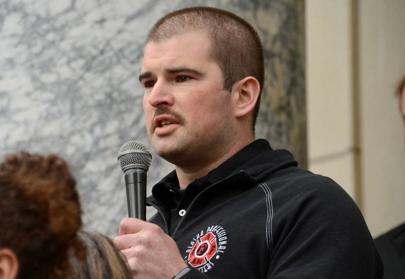 a man speaking into a microphone