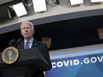 President Biden standing at a lectern