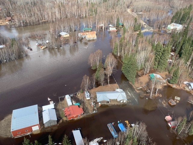 An aerial photo of a flooded village