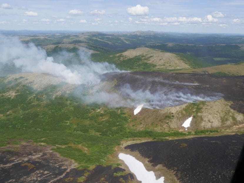 An aerial view of smoldering tundra