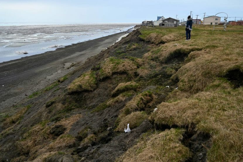Houses at the edge or an eroding coastal bluff