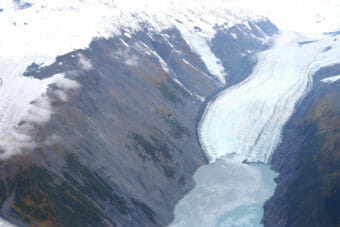 The terminus of a glacier in a fjord, seen from the air