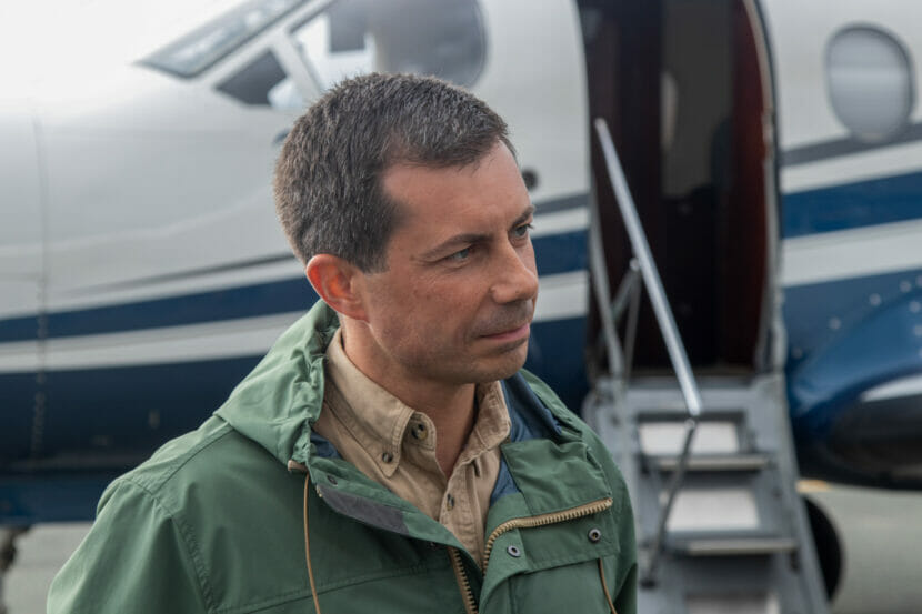 U.S. Secretary of Transportation Pete Buttigieg speaks with reporters at the Juneau International Airport on Wednesday August 16th, 2023 (Mikko Wilson/KTOO)