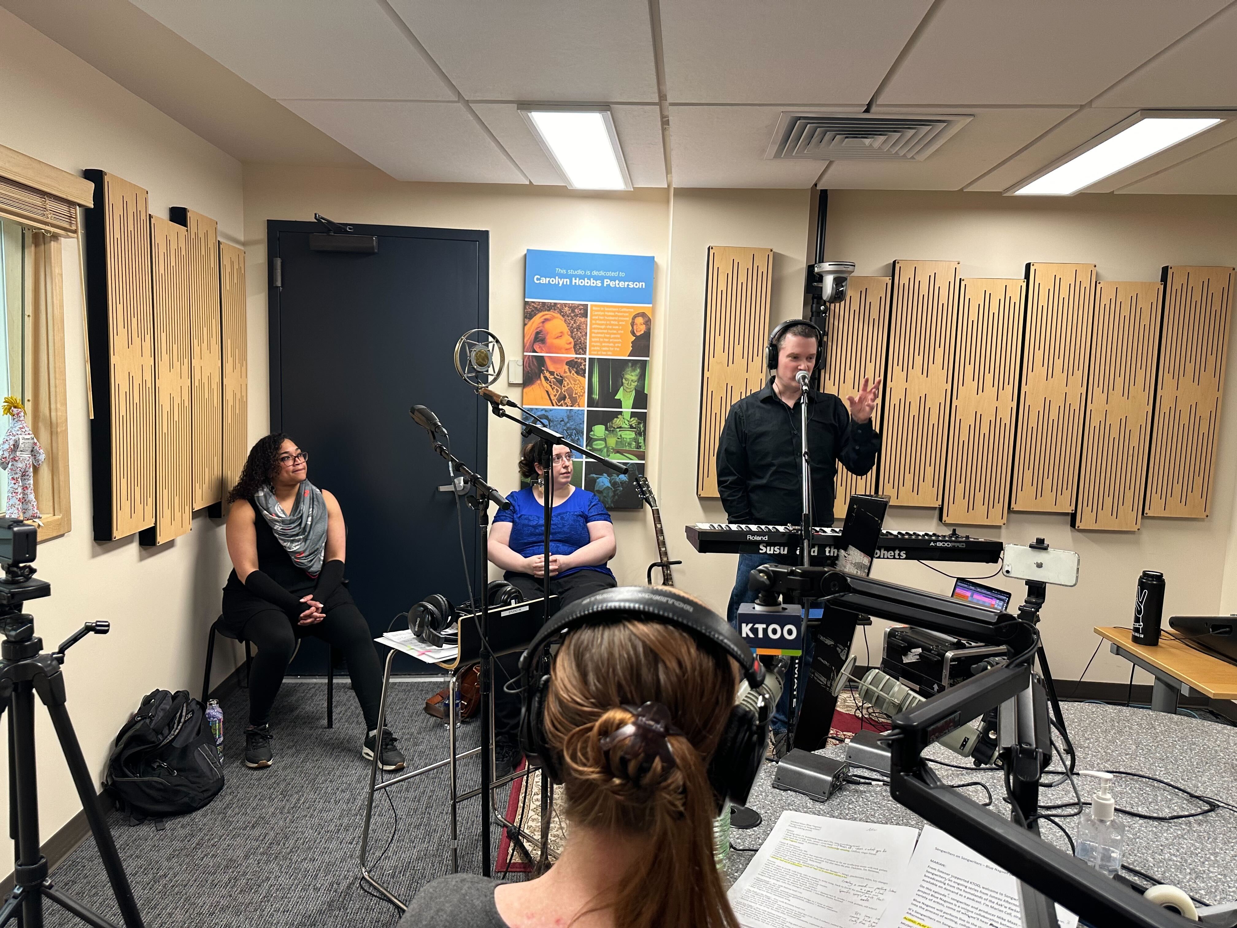 Mike Maas from Blue Nagoon with singers Salissa Thole and Kristina Paulick interview by singer-songwriter Marian Call in Studio 2K (Bostin Christopher/KTOO)
