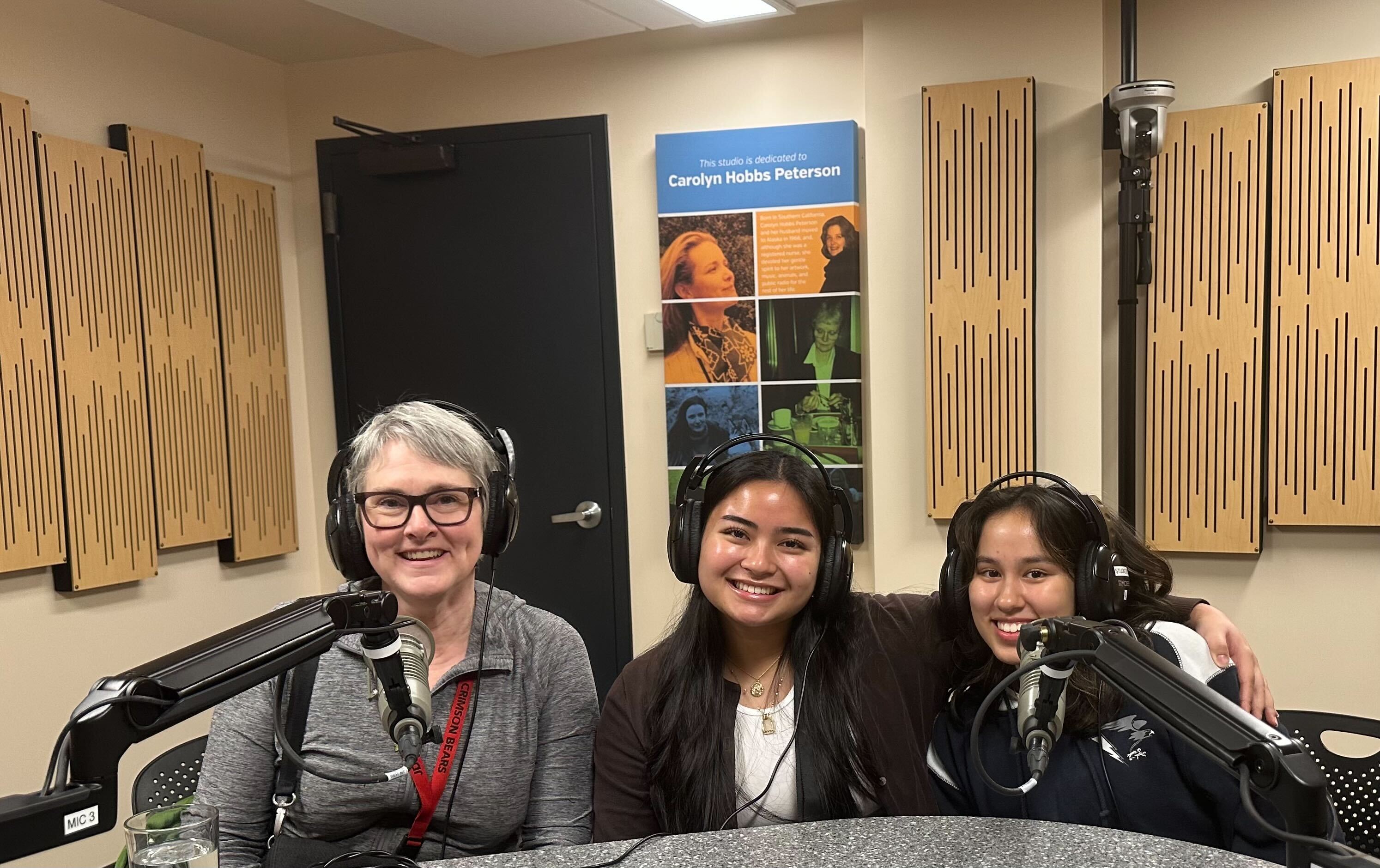 English teacher Angela Noon with students Cassie Lumba and Lumi Fermin in Studio 2K at KTOO for Juneau Afternoon. (Bostin Christopher/KTOO)