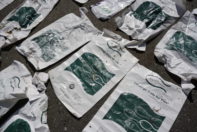 A shipping container full of the fish food bags fell off of a barge destined for the Petersburg landfill. (Photo by Alix Soliman/KTOO).