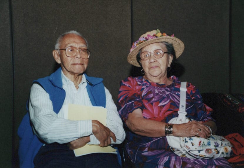 An older man and woman sit together. Brian Wallace's parents Amos and Dorothy Wallace at the National Congress of American Indians in 2000. From the Cyril George Photo Collection.