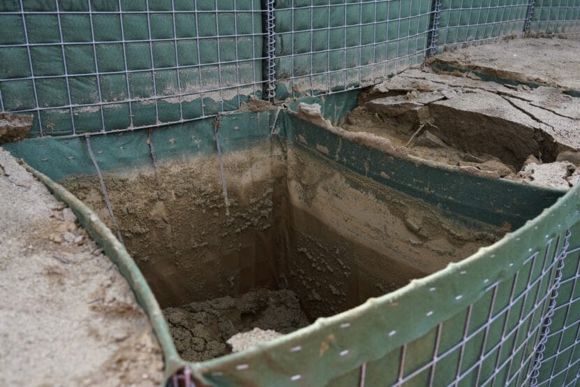 Floodwaters compromised some HESCO barriers behind Jeff Garmon's house on Meander Way. (Photo by Alix Soliman/KTOO)
