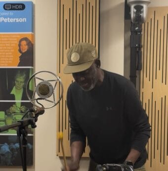 Mike Sibanda playing marimba on Juneau Afternoon, August 13, 2025. (Bostin Christopher/KTOO)