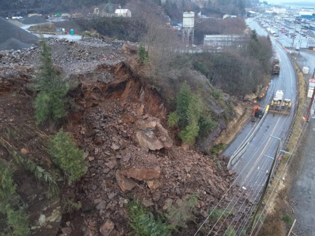 a landslide covers a highway