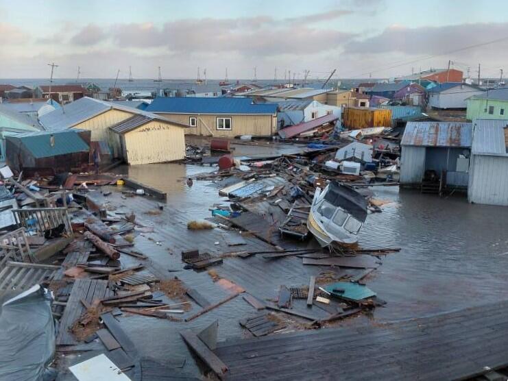 Parts of Kipnuk are covered with water and debris M