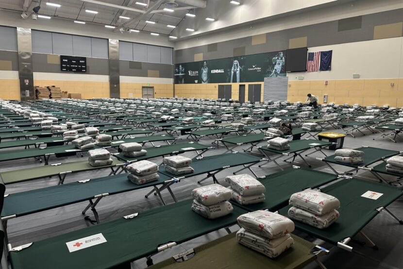 Cots line the floor at the Alaska Airlines Center on the campus of the University of Alaska Anchorage.