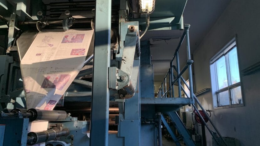 Sun shines on the Peninsula Clarion's since-dismantled Goss Suburban printing press on Saturday, Oct. 22, 2022 in Kenai, Alaska.