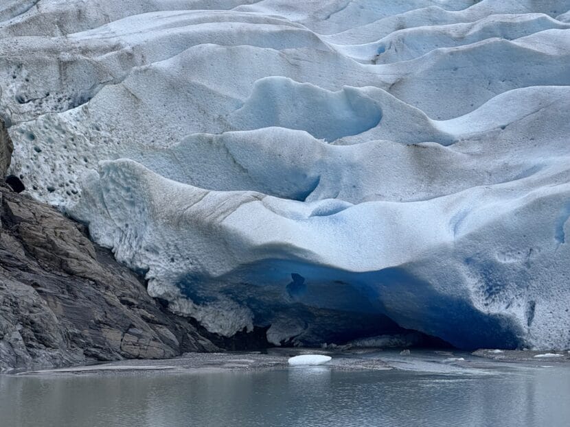 The northern end of the Mendenhall Glacier's terminus, where it's perched above lake sediment, on November 23, 2025. (Photo by Alix Soliman/KTOO)