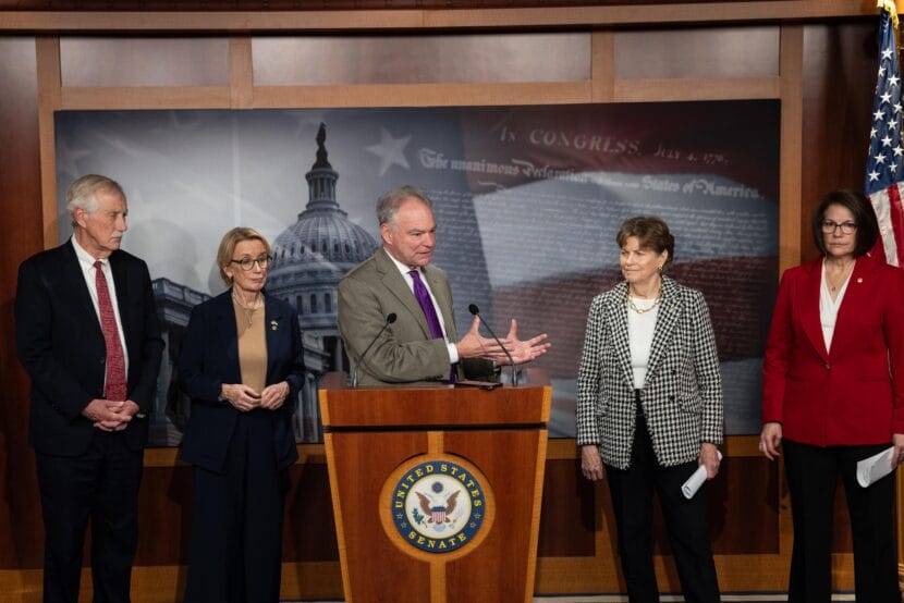 Sen. Tim Kaine, D-Va., speaks during a press conference following a vote on Capitol Hill on Sunday. The Senate convened for a rare Sunday session in an attempt to end the government shutdown.