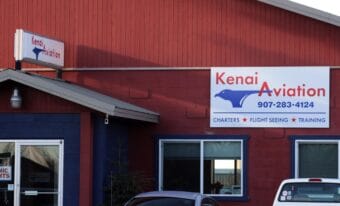 Cars park outside the Kenai Aviation office on Monday, Nov. 3, 2025 in Kenai, Alaska.