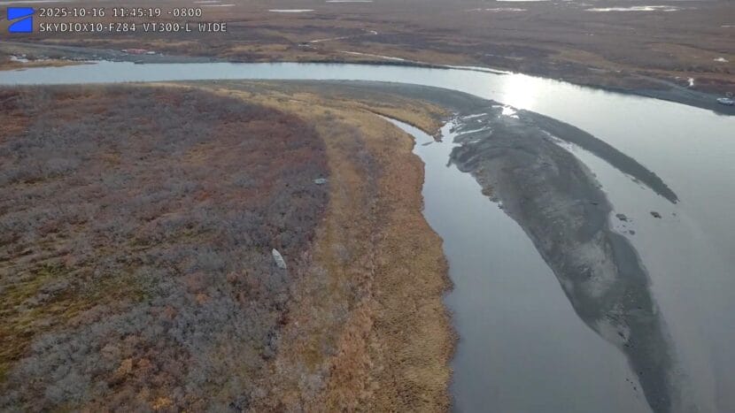 Boats washed up into the trees by the remnants of Typhoon Halong are seen across the Kanektok River from the community of Quinhagak on Oct. 16, 2025.