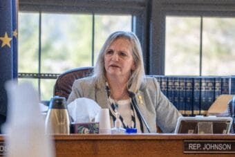 Woman in committee room