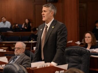 Rep. Andrew Gray, D-Anchorage, speaks Friday, April 26, 2024, on the floor of the Alaska House of Representatives.