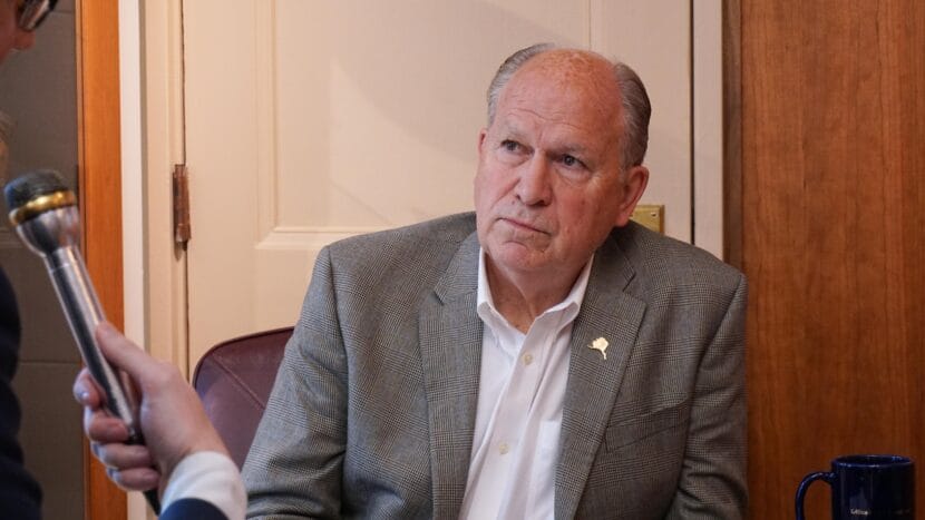 Alaska Gov. Bill Walker listens to a question from KTOO and Alaska Public Media reporter Andrew Kitchenman from his Capitol office in Juneau on June 19, 2018.